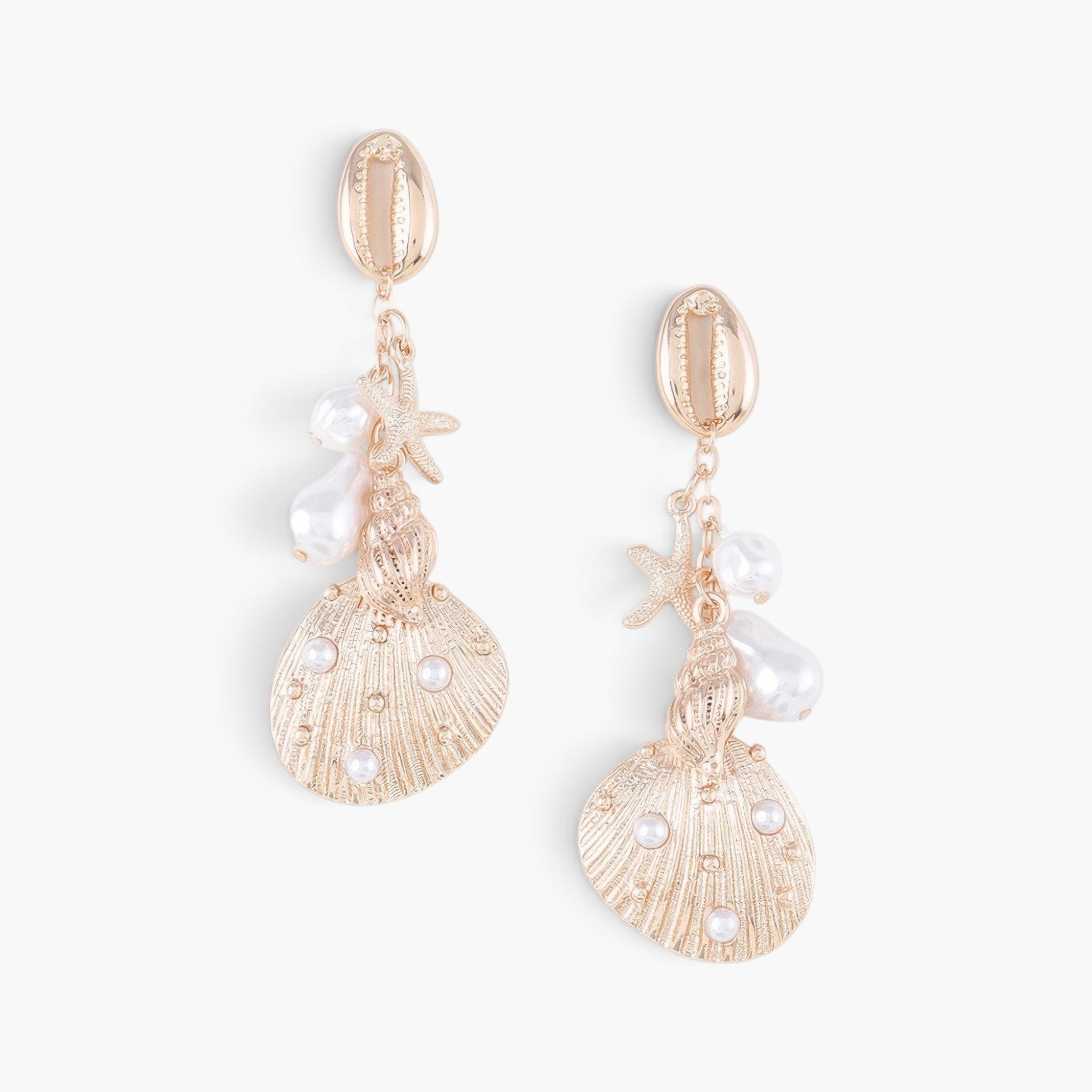 Beach Rose Co. gold-plated drop earrings featuring shell and starfish charms with cream pearls on a white background.