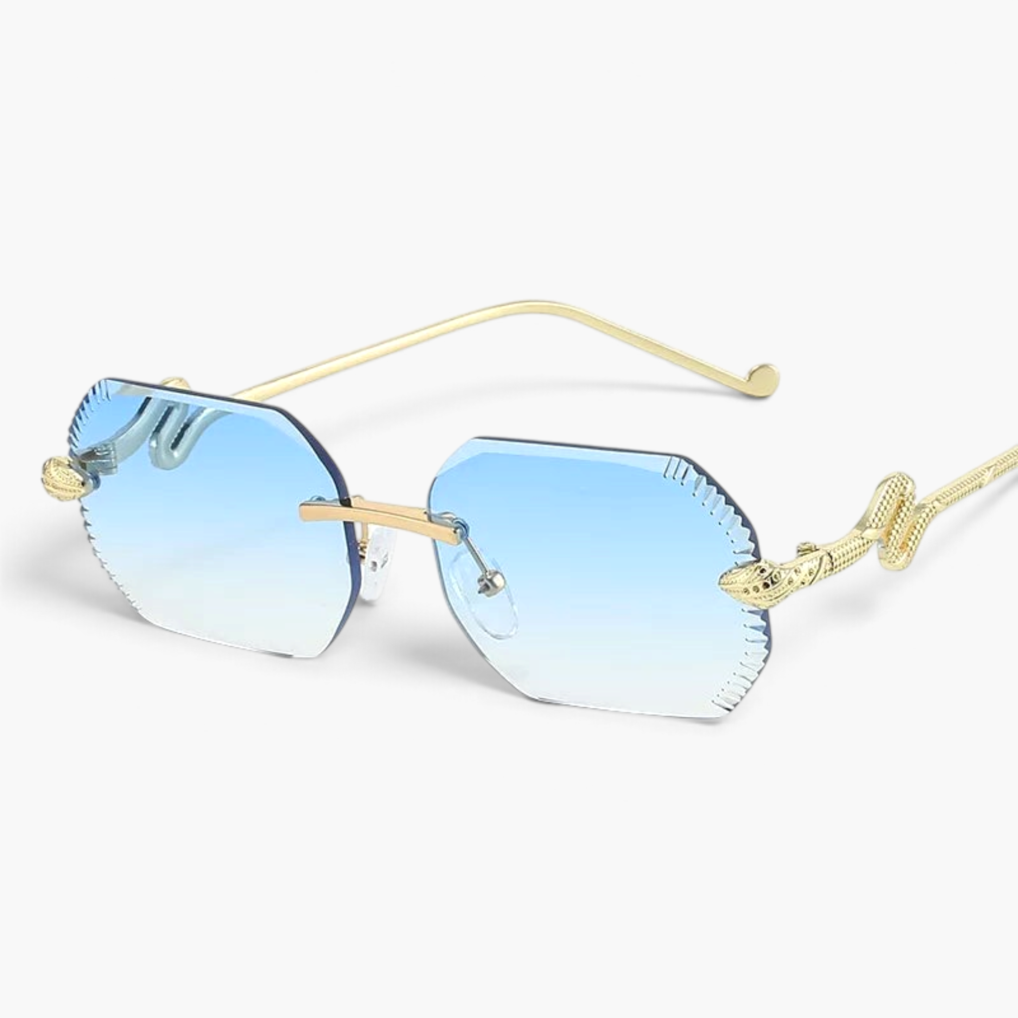 Beach Rose Co. rimless geometric sunglasses with blue gradient lenses and gold sculpted snake temple details.