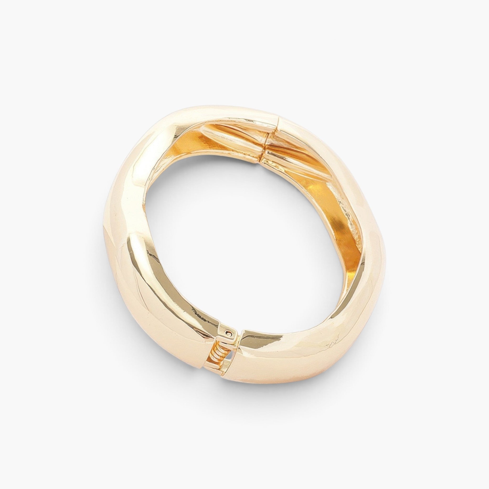 Beach Rose Co. gold metal bangle bracelet with a polished finish and convenient spring hinge closure