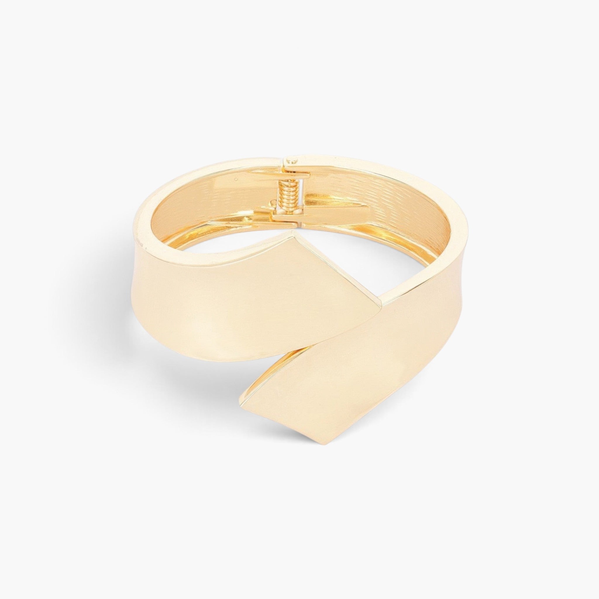 Beach Rose Co. gold-plated metal bangle featuring a sleek minimalist design and a functional spring hinge closure.
