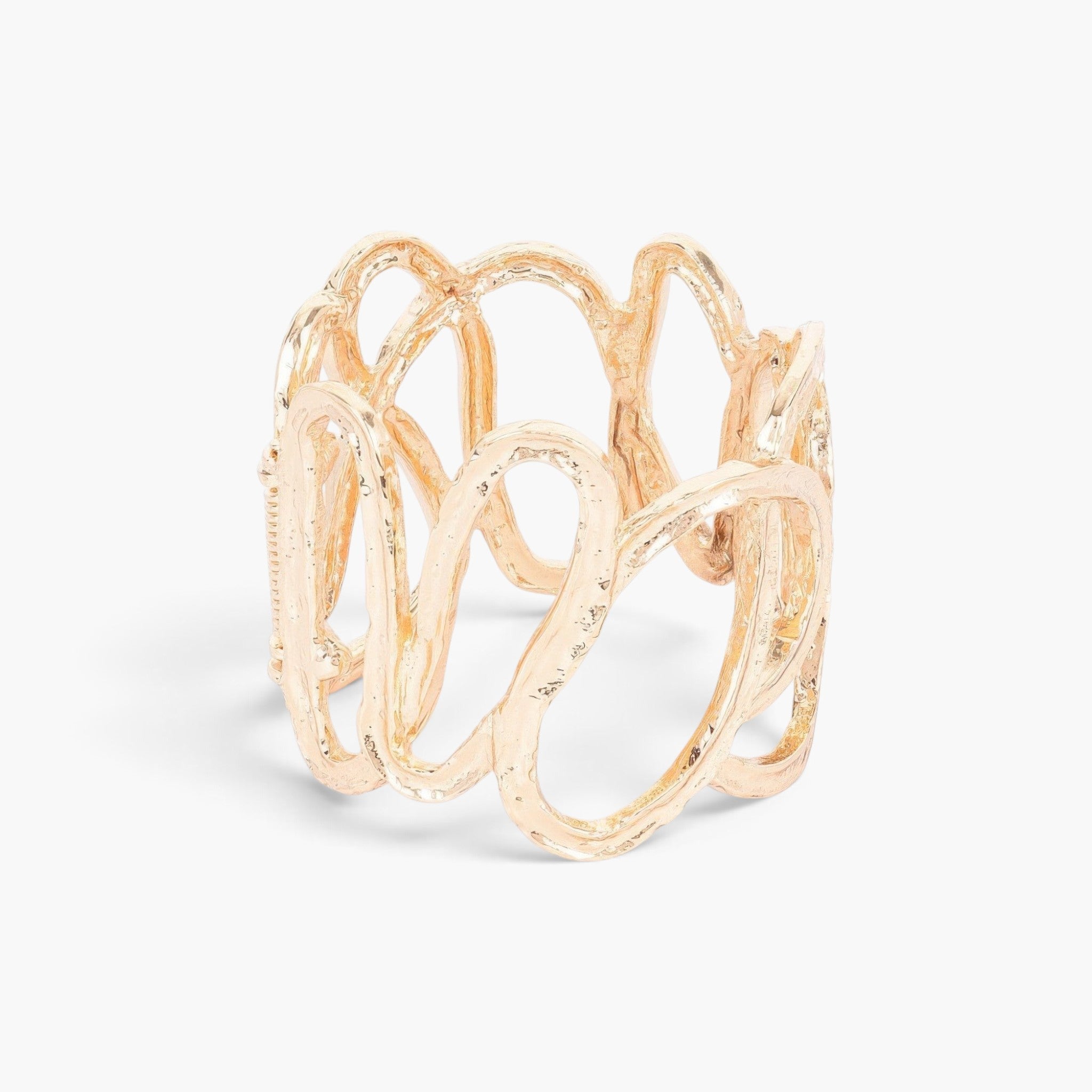 Beach Rose Co. gold alloy casting stretch bracelet with an organic, open-work textured design.