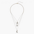 Beach Rose Co. 18K gold-plated layered necklace featuring a zircon sun, teardrop crystal, and crescent moon pendants.