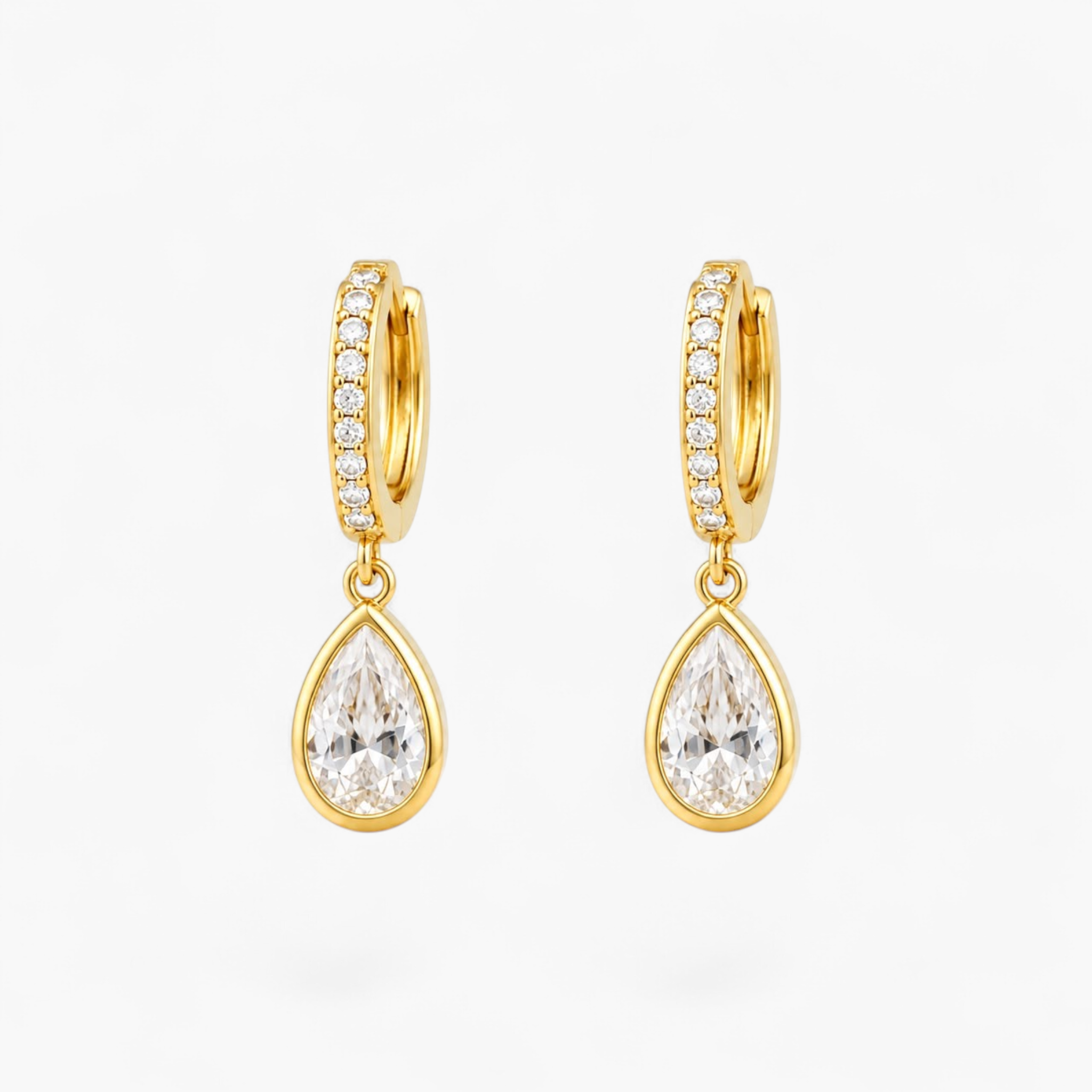 Beach Rose Co. 18K gold filled huggie earrings featuring a sparkling teardrop cubic zirconia charm on a CZ-lined hoop.