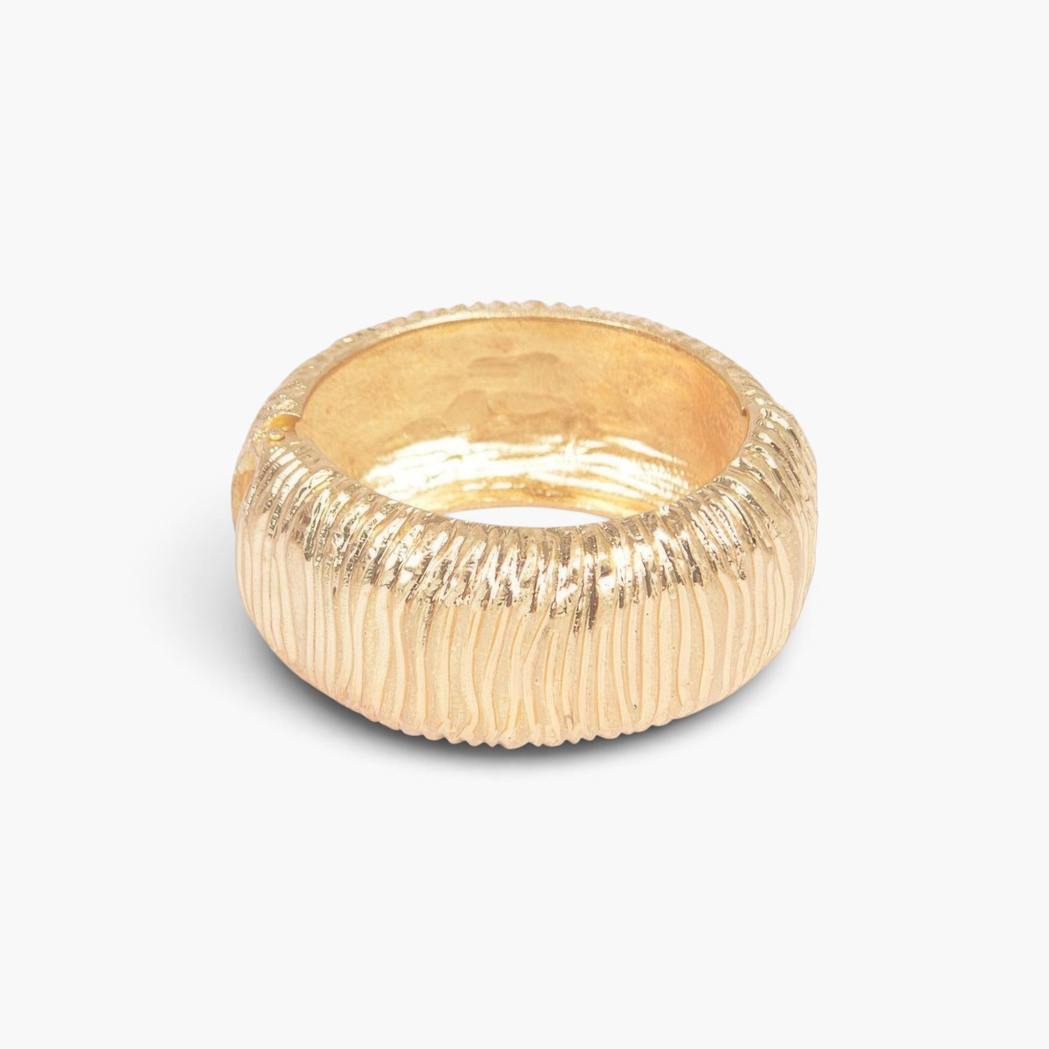 Beach Rose Co. gold cast metal cuff bracelet with a textured surface and convenient spring hinge closure.