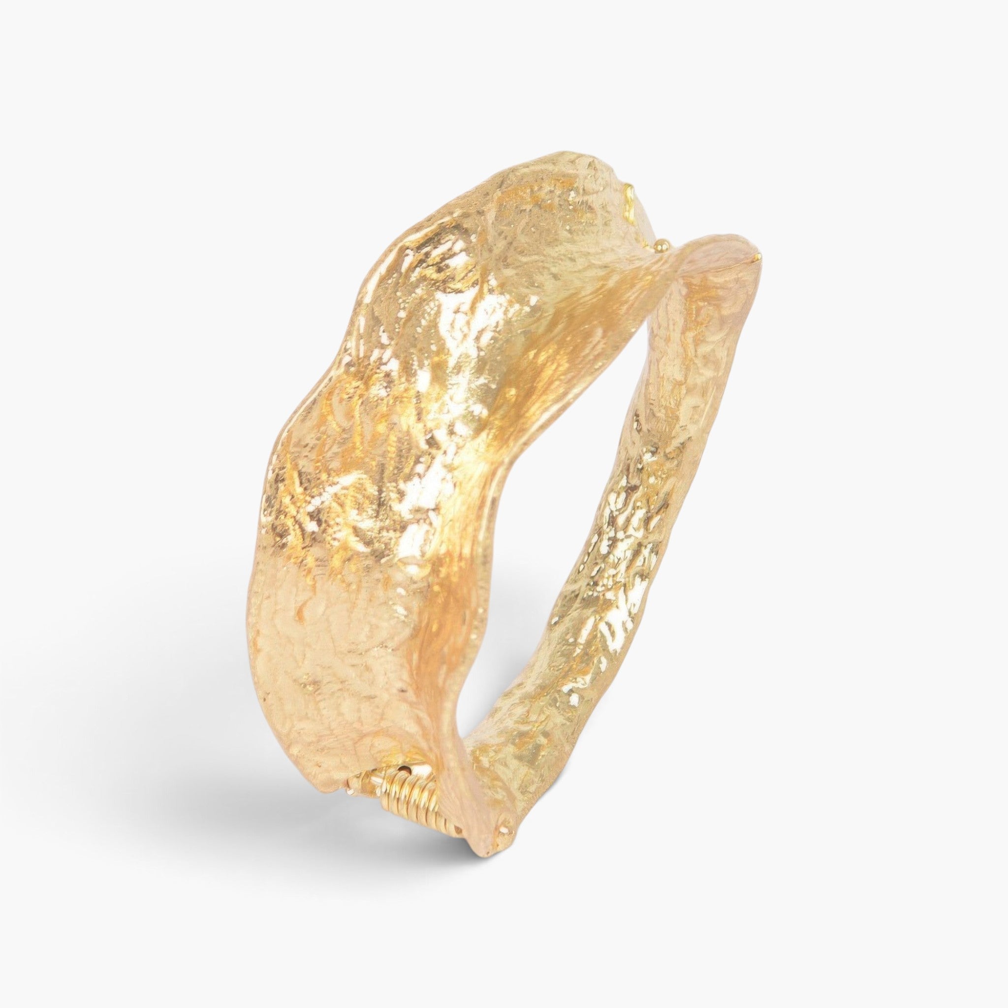 Beach Rose Co. gold metal cuff bracelet with a textured, organic vintage-inspired finish on a white background.