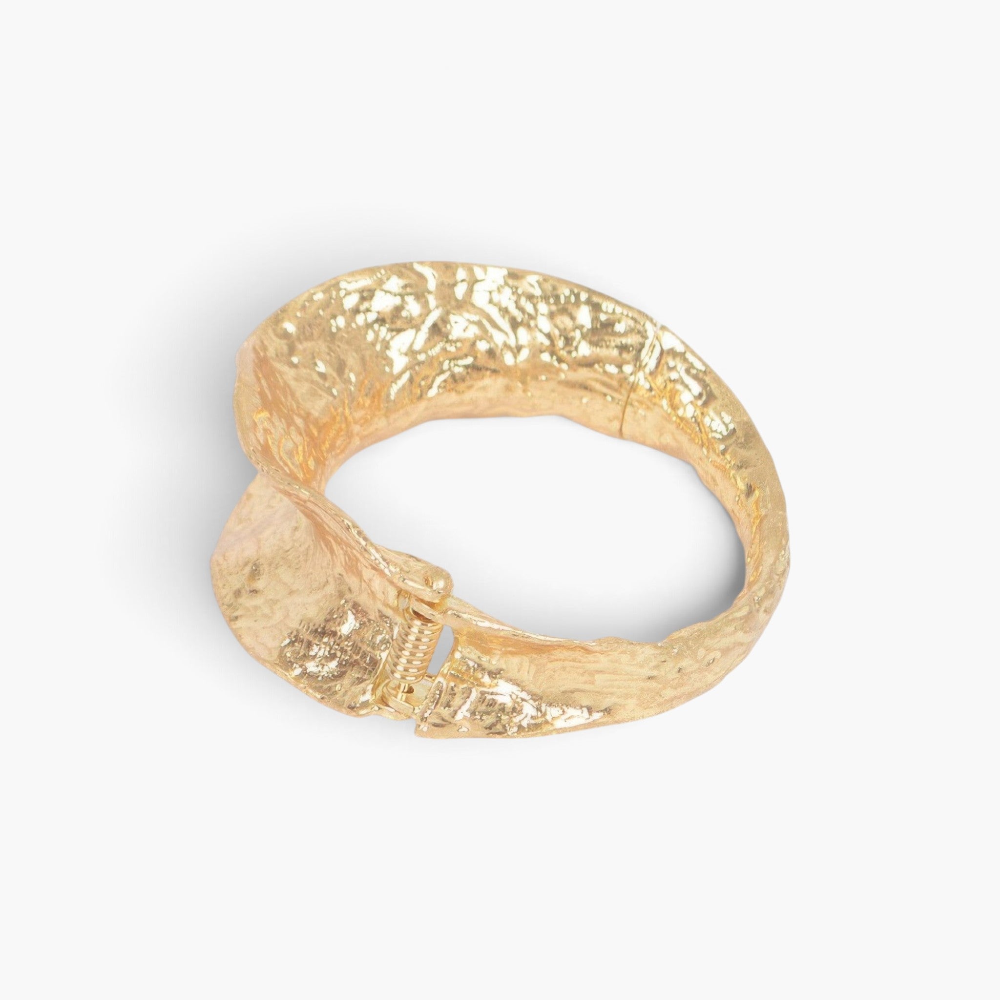 Beach Rose Co. gold metal cuff bracelet with a textured vintage-inspired finish and a hinged clasp design.