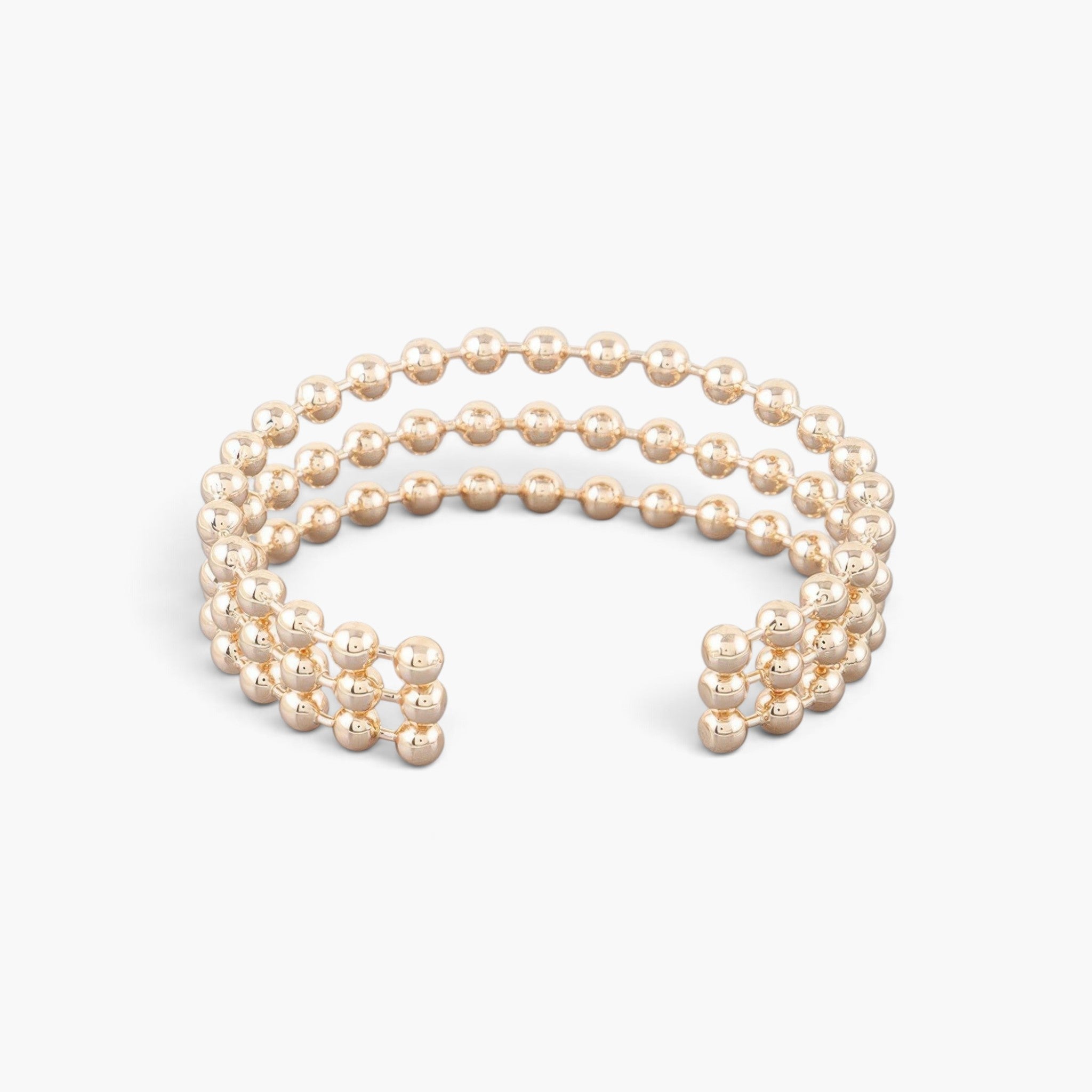 Beach Rose Co. wide triple beaded cuff bracelet in polished gold featuring three rows of spherical metal beads.