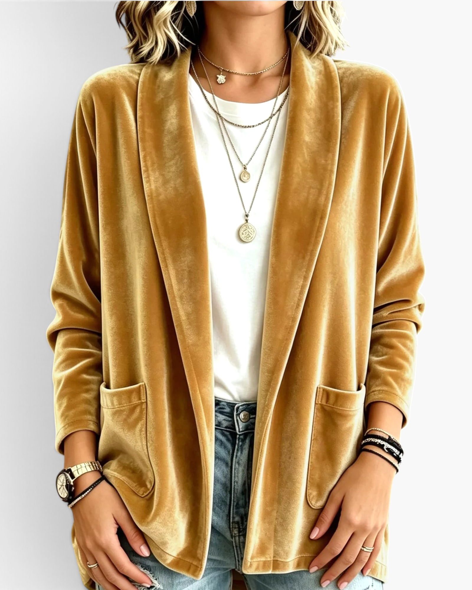 Beach Rose Co. gold velour open-front cardigan with patch pockets worn over a white tee and blue jeans.