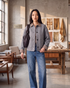 Beach Rose Co. gray button-front jacket with brown and cream gingham collar and cuffs, worn with blue jeans.