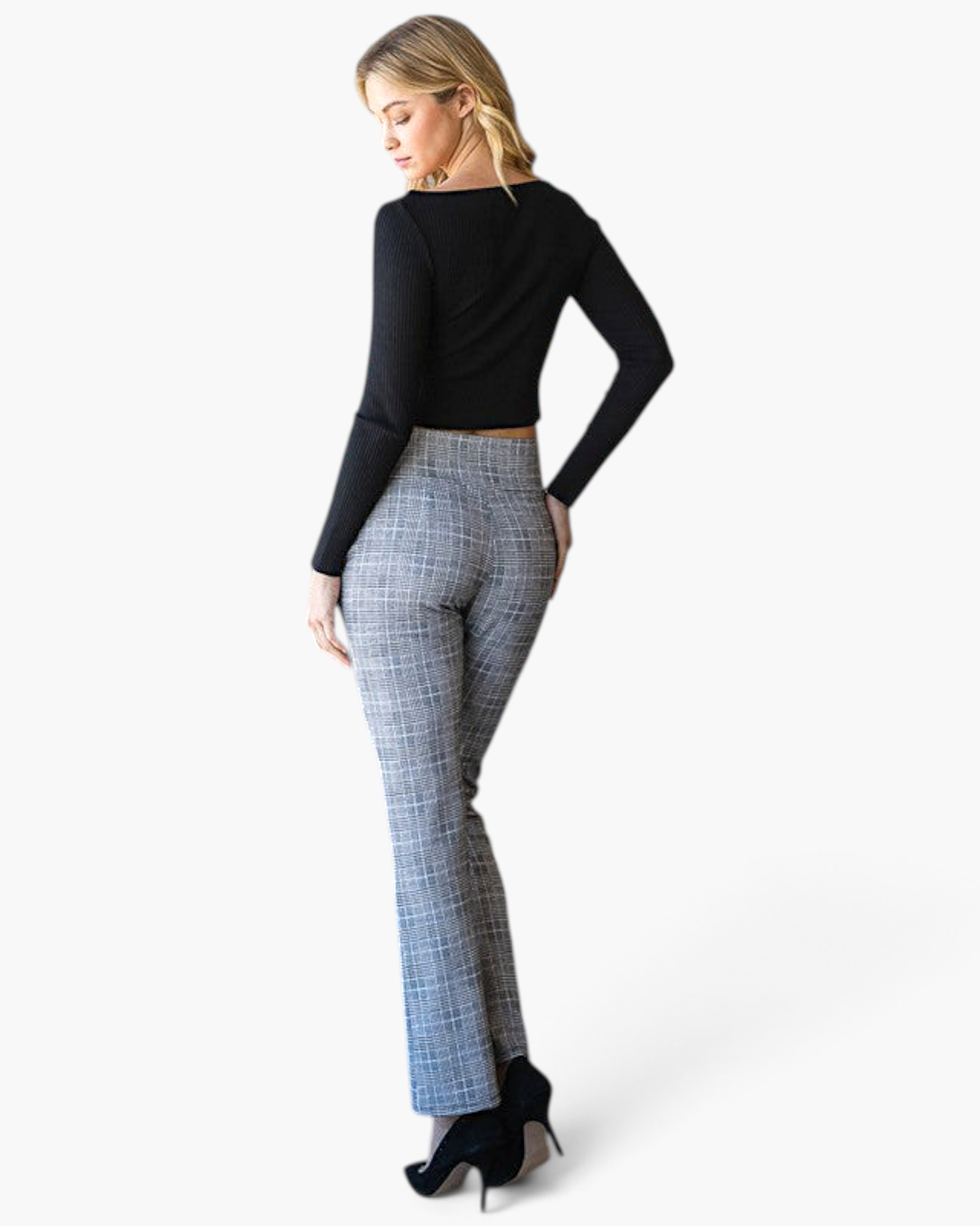 Beach Rose Co. gray plaid high-rise flare pants worn by a model with a black long-sleeve top and heels