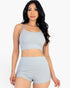 Beach Rose Co. gray ribbed cami crop top and matching ruched shorts set worn by a model against a white background.