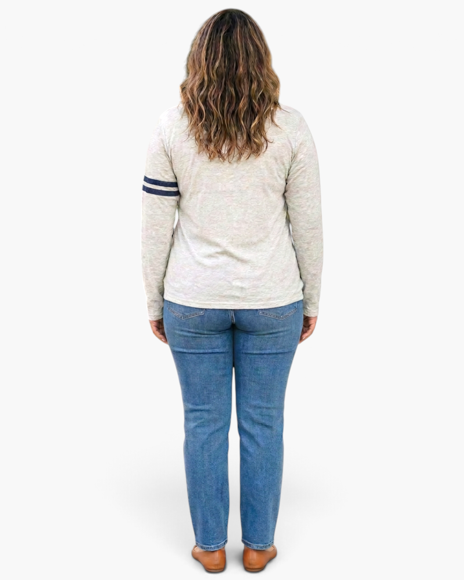 Beach Rose Co. light gray long sleeve cotton top with navy sleeve stripes worn by a woman with wavy hair from behind