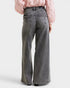 Beach Rose Co. Gray wash wide leg jeans with mid-rise waist and pockets. Made from cotton blend.