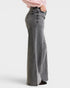 Beach Rose Co. Gray wash wide leg jeans with mid-rise waist and split back yoke. Made of cotton blend.