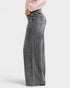 Beach Rose Co. Gray wash wide leg jeans with mid-rise waist and pockets. Made of cotton blend.