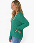 Beach Rose Co. green cable knit V-neck hooded sweater with dropped shoulders and contrasting drawstrings on a model