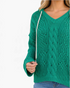 Beach Rose Co. green cable knit V-neck hooded sweater with openwork details and contrasting white drawstrings