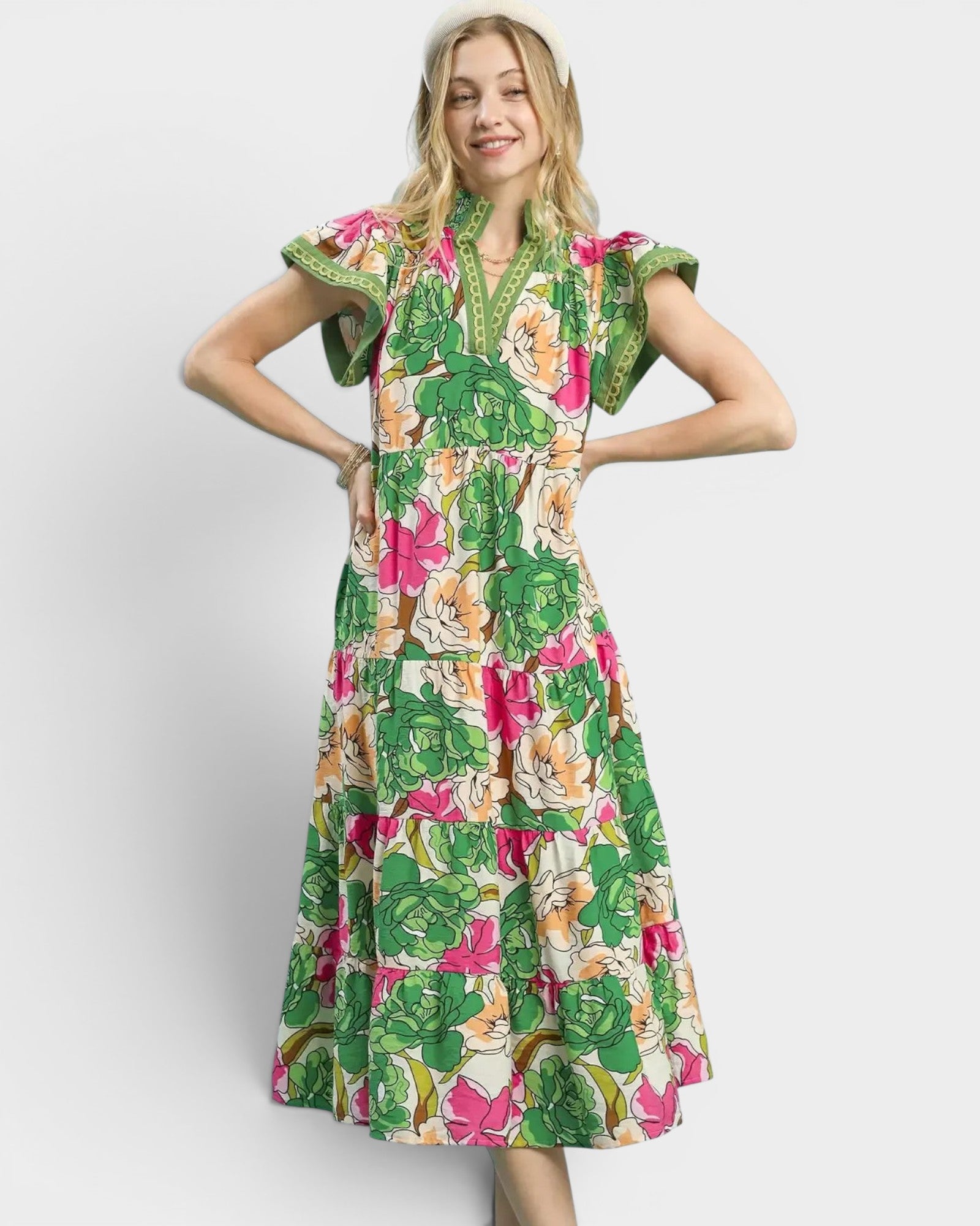 Beach Rose Co. green floral midi dress with flutter sleeves, split neckline, stand collar, and tiered silhouette. Made of rayon and nylon.
