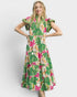 Beach Rose Co. green floral midi dress with flutter sleeves, split neckline, stand collar, and tiered silhouette. Made of rayon and nylon.