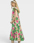 Beach Rose Co. green floral midi dress with split neckline, stand collar, flutter sleeves, and tiered silhouette. Rayon/nylon blend.