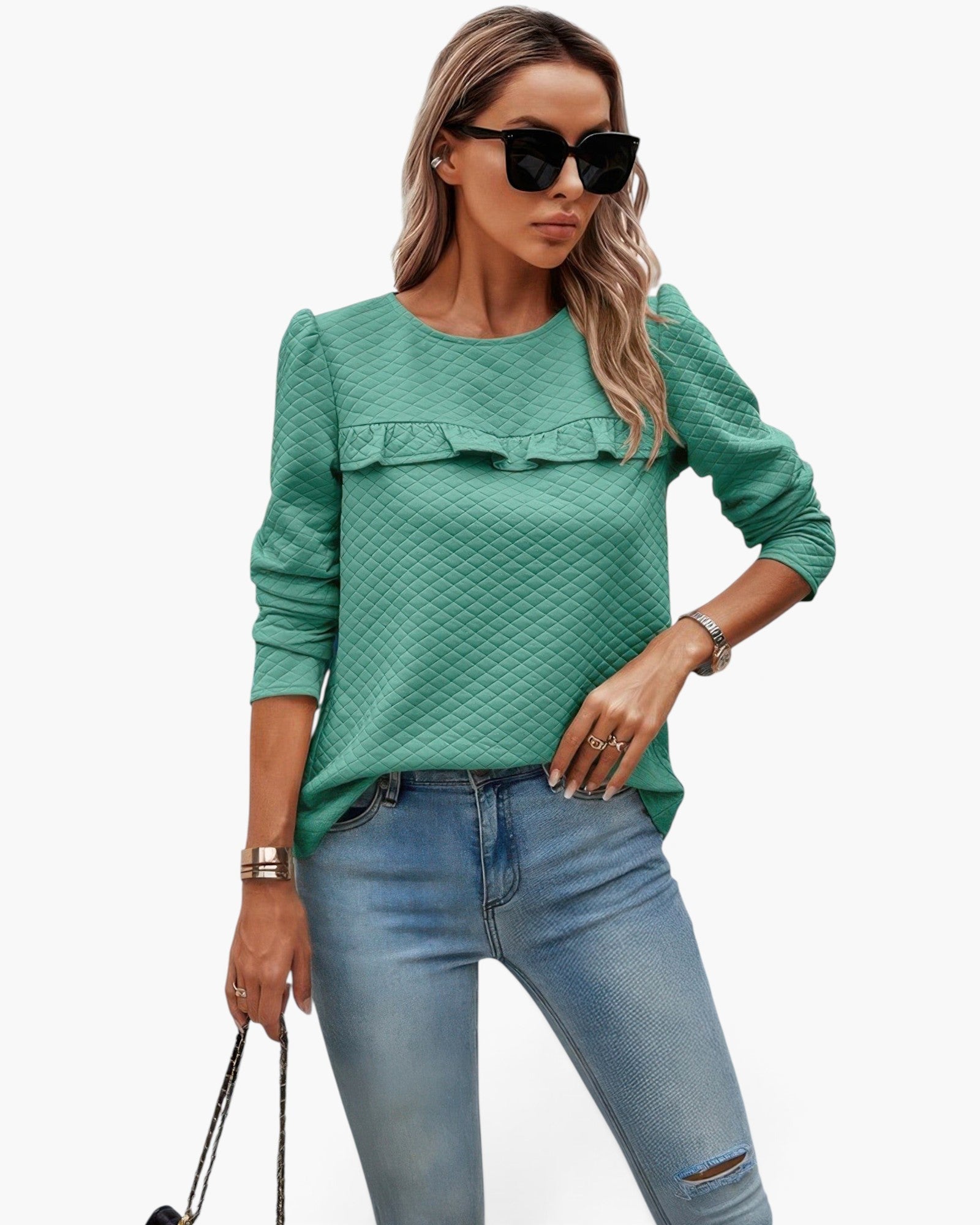 Beach Rose Co. green quilted crewneck pullover with ruffle detail on the chest worn by a woman in sunglasses