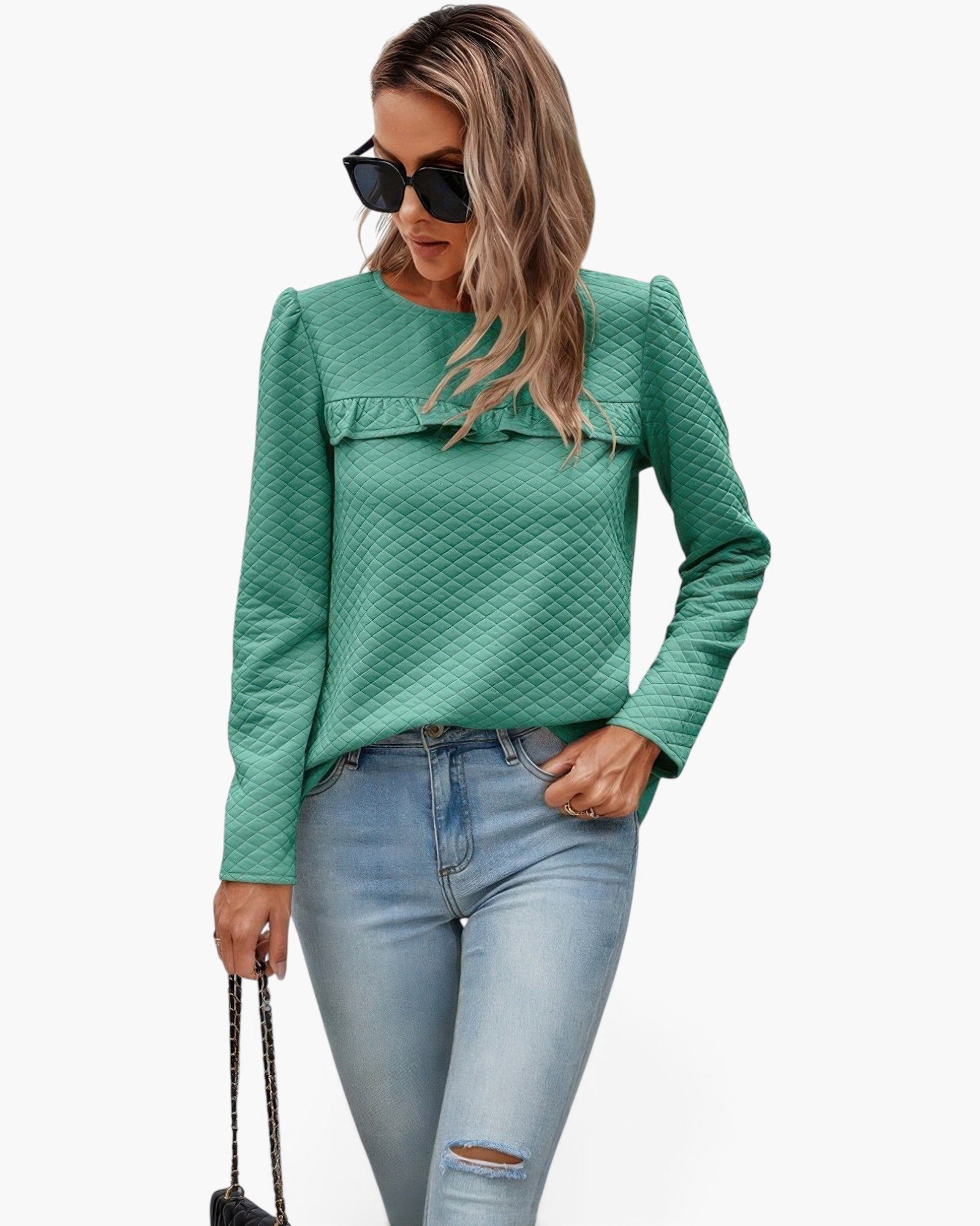 Beach Rose Co. green quilted crewneck pullover with front ruffle detail worn by a woman with sunglasses and jeans