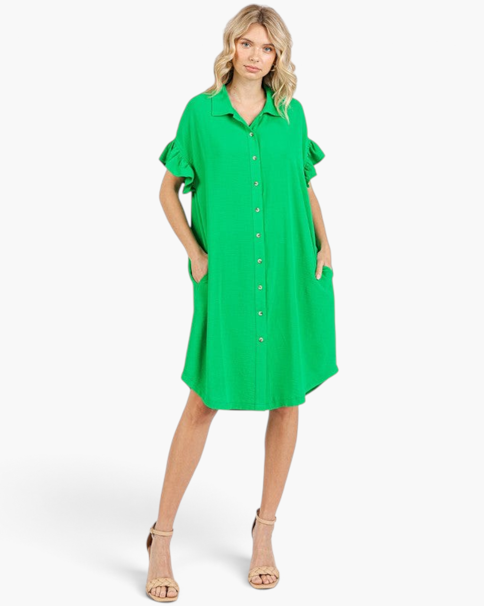 Beach Rose Co. green shirt dress with ruffled sleeves, button front, and side pockets on a model with beige heels.