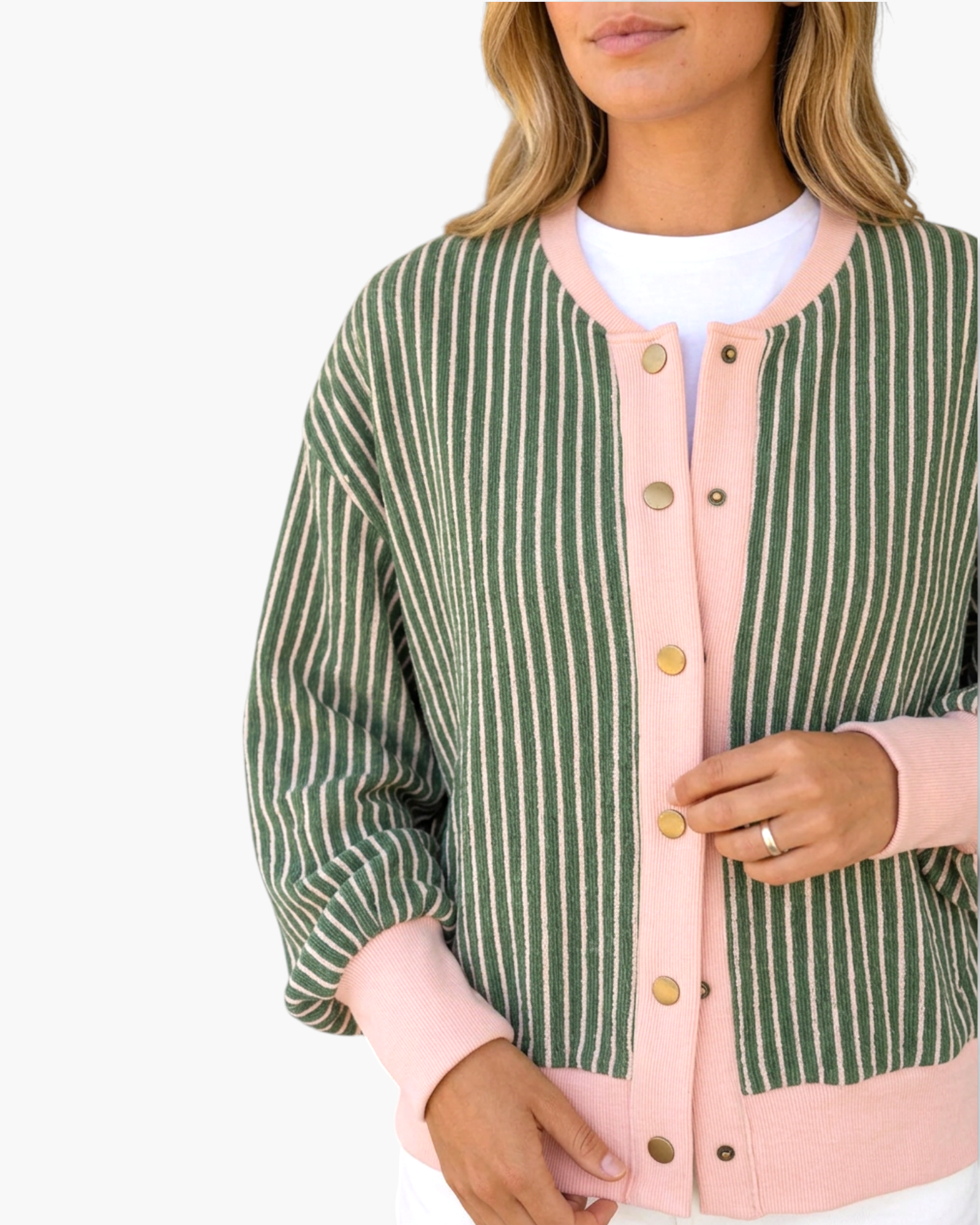 Beach Rose Co. green and white striped cardigan with a pink snap-front placket, neckline, and cuffs.