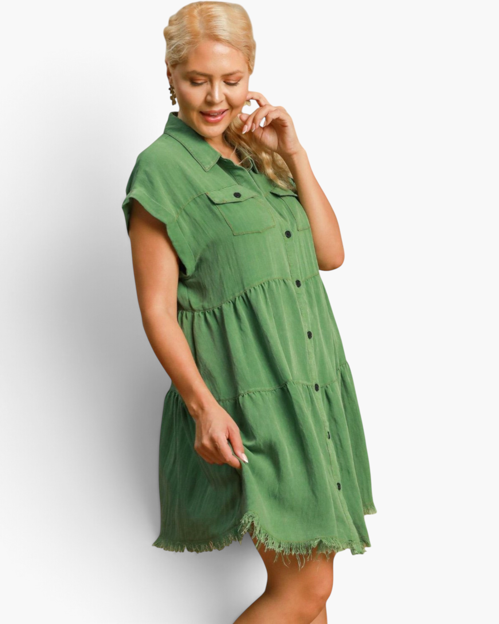 Beach Rose Co. green tiered shirt dress with button front, chest pockets, and frayed hem on a blonde model