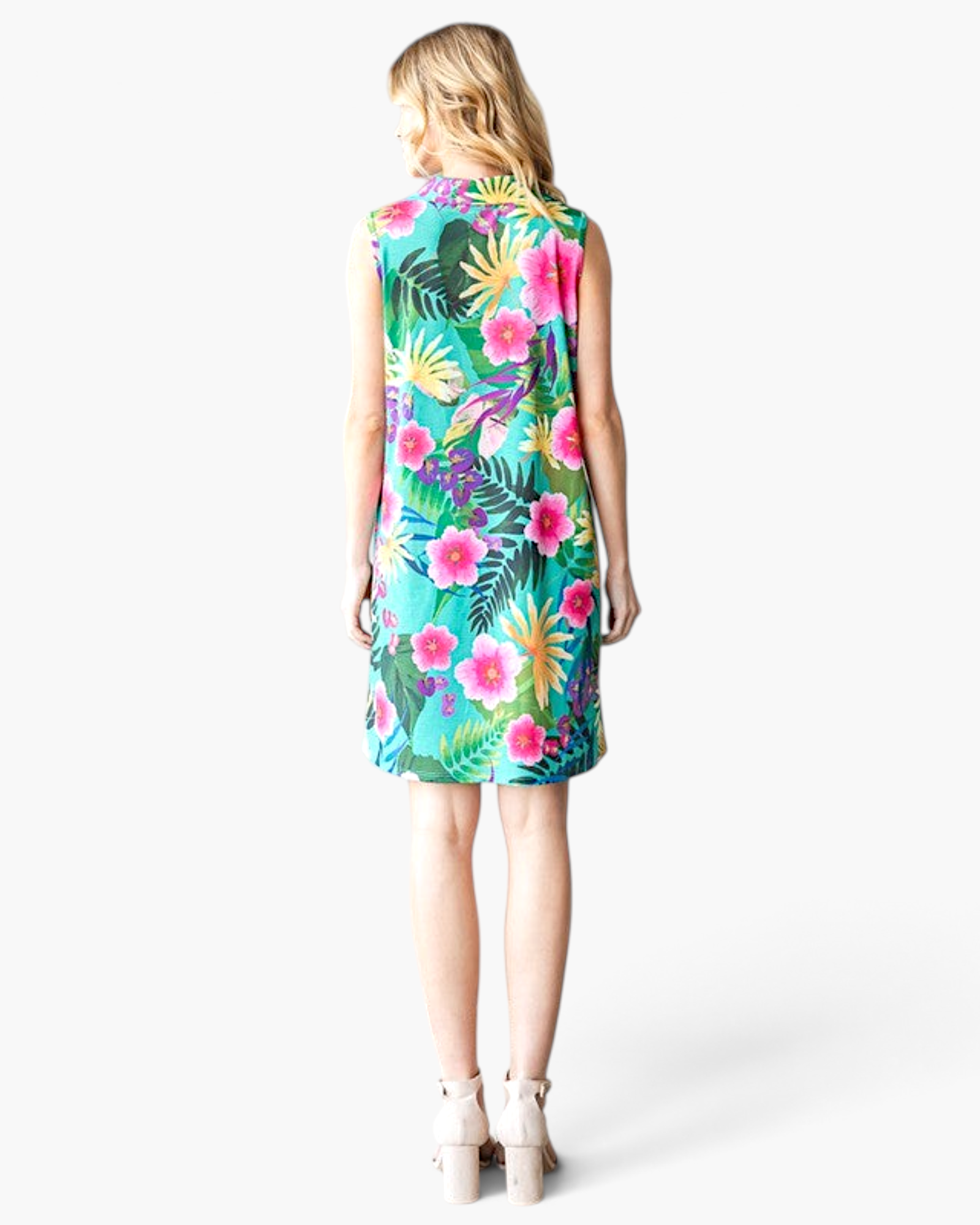 Beach Rose Co. green sleeveless swing dress with a vibrant tropical floral print, shown from the back.