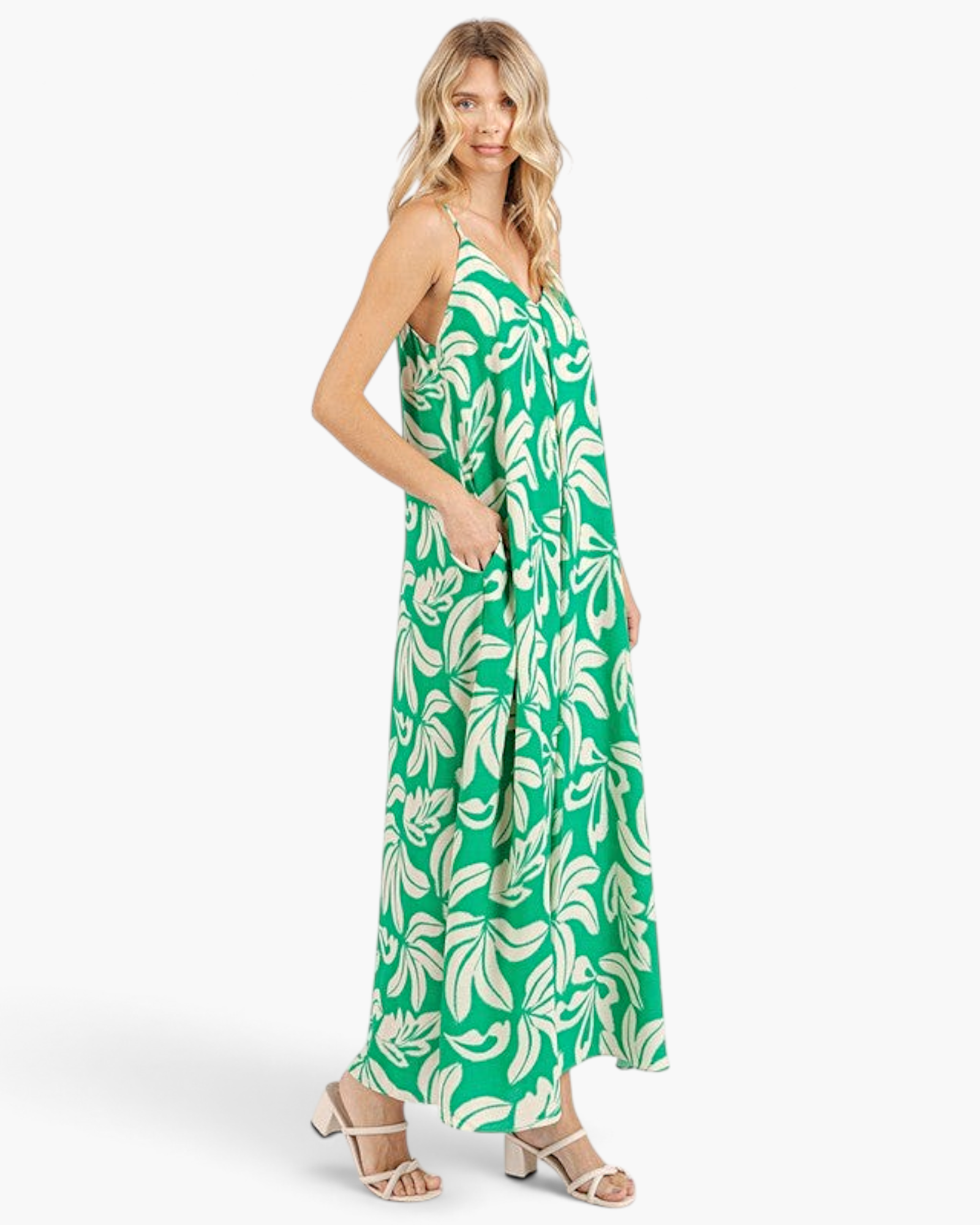 Beach Rose Co. green maxi dress with ivory tropical leaf print, V-neck, adjustable straps, and side pockets.