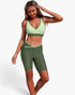 Beach Rose Co. two-piece yoga set with a light green sleeveless sports bra and dark olive green high-waisted shorts.