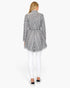 Beach Rose Co. grey wool blend cardigan with intricate cable knit pattern and belted waist, back view on a model.