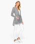 Beach Rose Co. grey cable knit open cardigan with belt string and front pockets worn by a blonde model