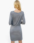 Back view of a Beach Rose Co. grey crew neck dress with a high waist drawstring, worn by a blonde woman.