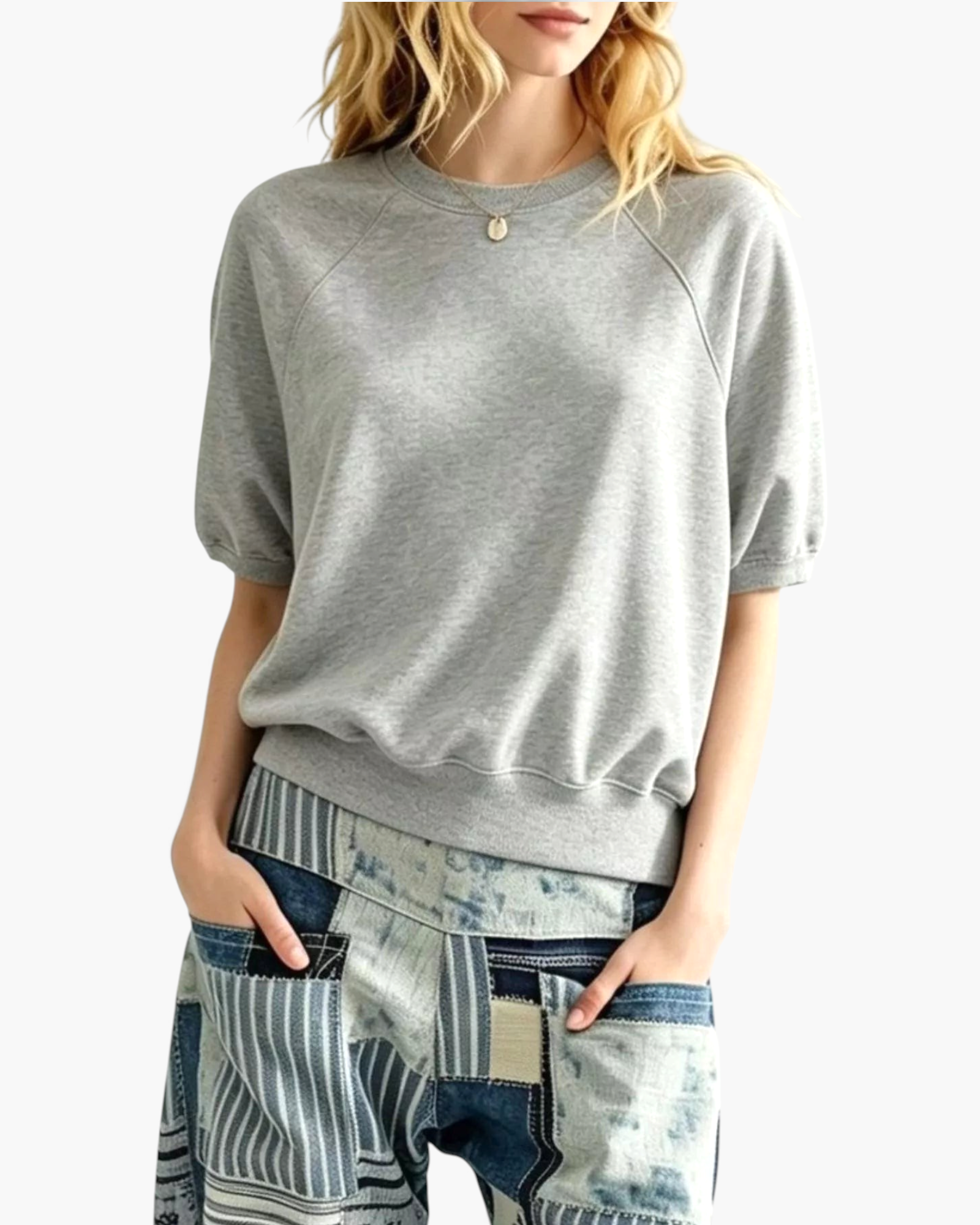 Beach Rose Co. grey polyester crewneck sweatshirt with elbow-length puff sleeves and raglan seams on a model