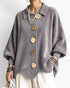 Beach Rose Co. grey ribbed knit cardigan with oversized buttons, balloon sleeves, collar, and a scalloped hem.
