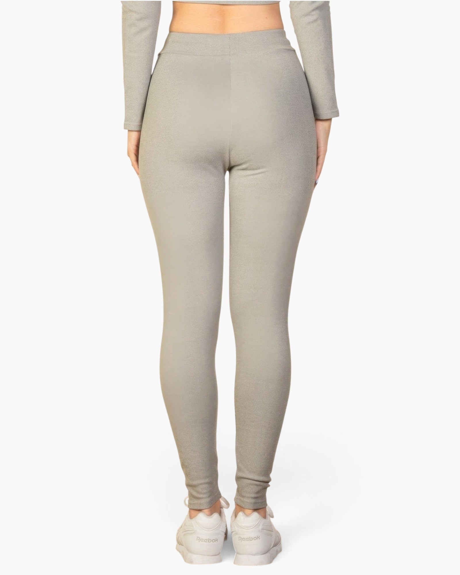 Beach Rose Co. grey ribbed lounge leggings with a high elastic waistband, worn by a model from the back view.