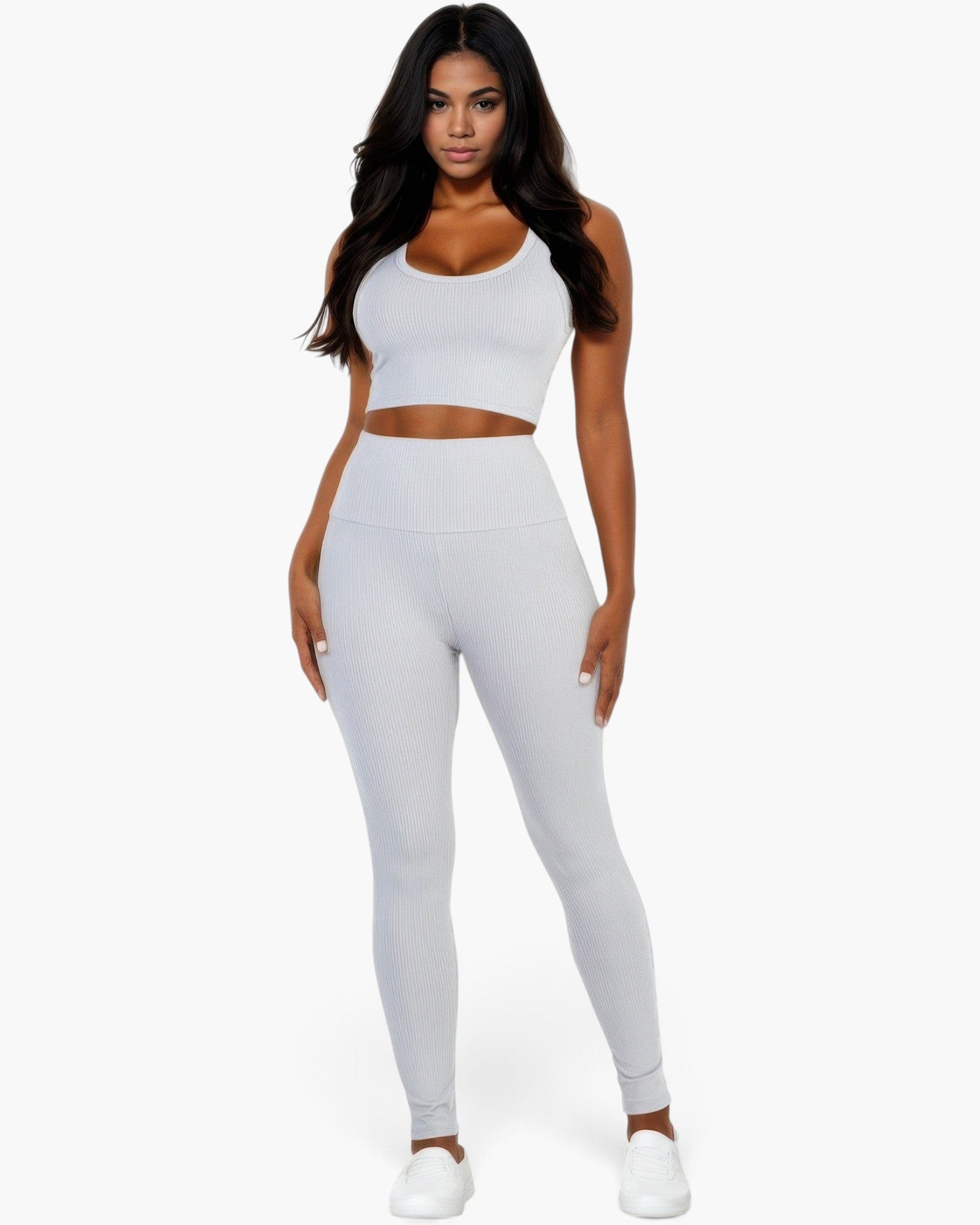 Beach Rose Co. model wearing a light grey ribbed crop top and high-waisted leggings set for a sleek activewear look.
