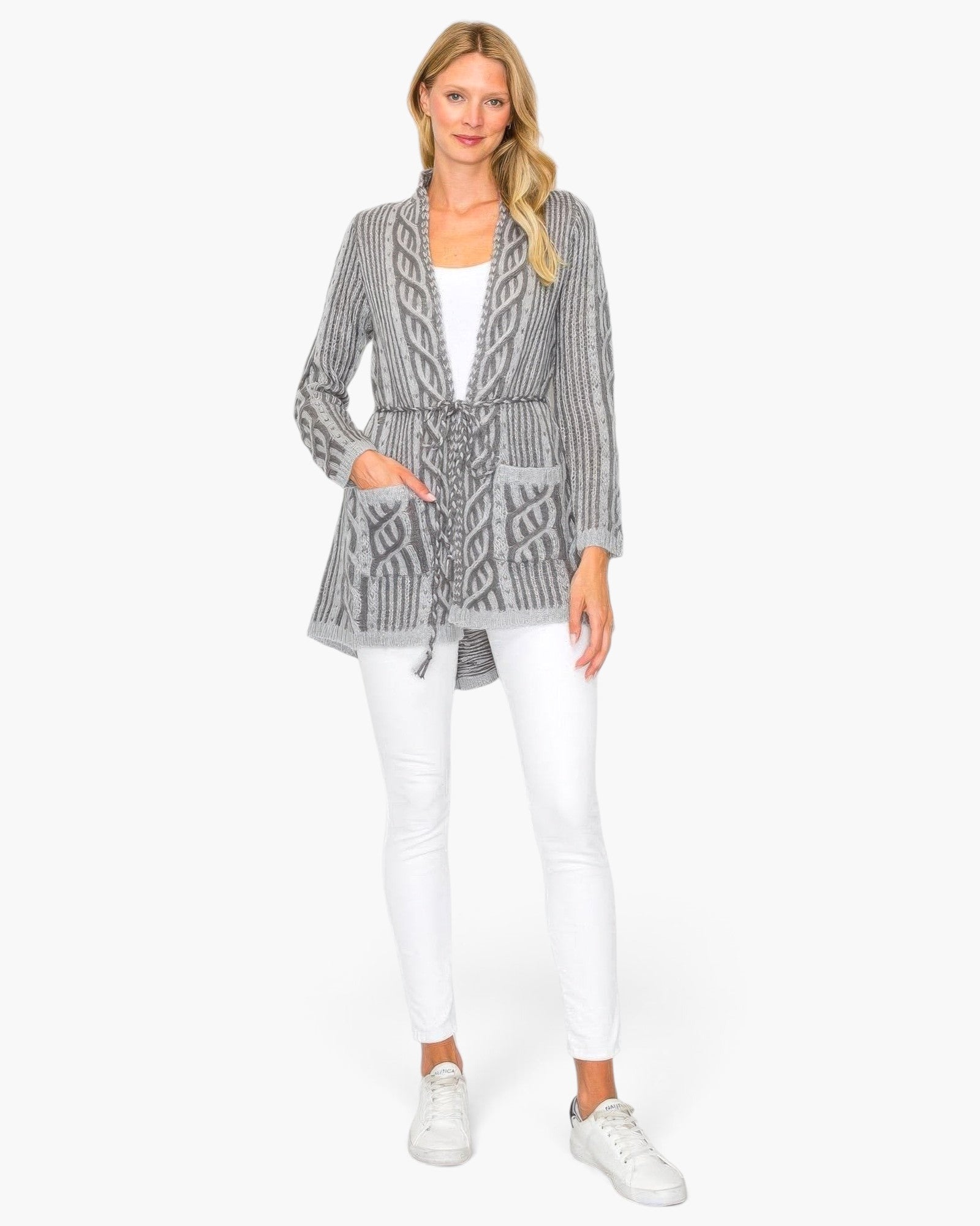 Beach Rose Co. grey cable knit open wool cardigan with belt string and front pockets worn by a blonde model