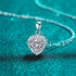 Beach Rose Co. silver heart-shaped moissanite pendant necklace with a zircon halo on a delicate link chain.