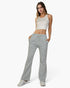 Beach Rose Co. heather gray bootcut sweatpants with a drawstring waist and slant pockets worn by a woman