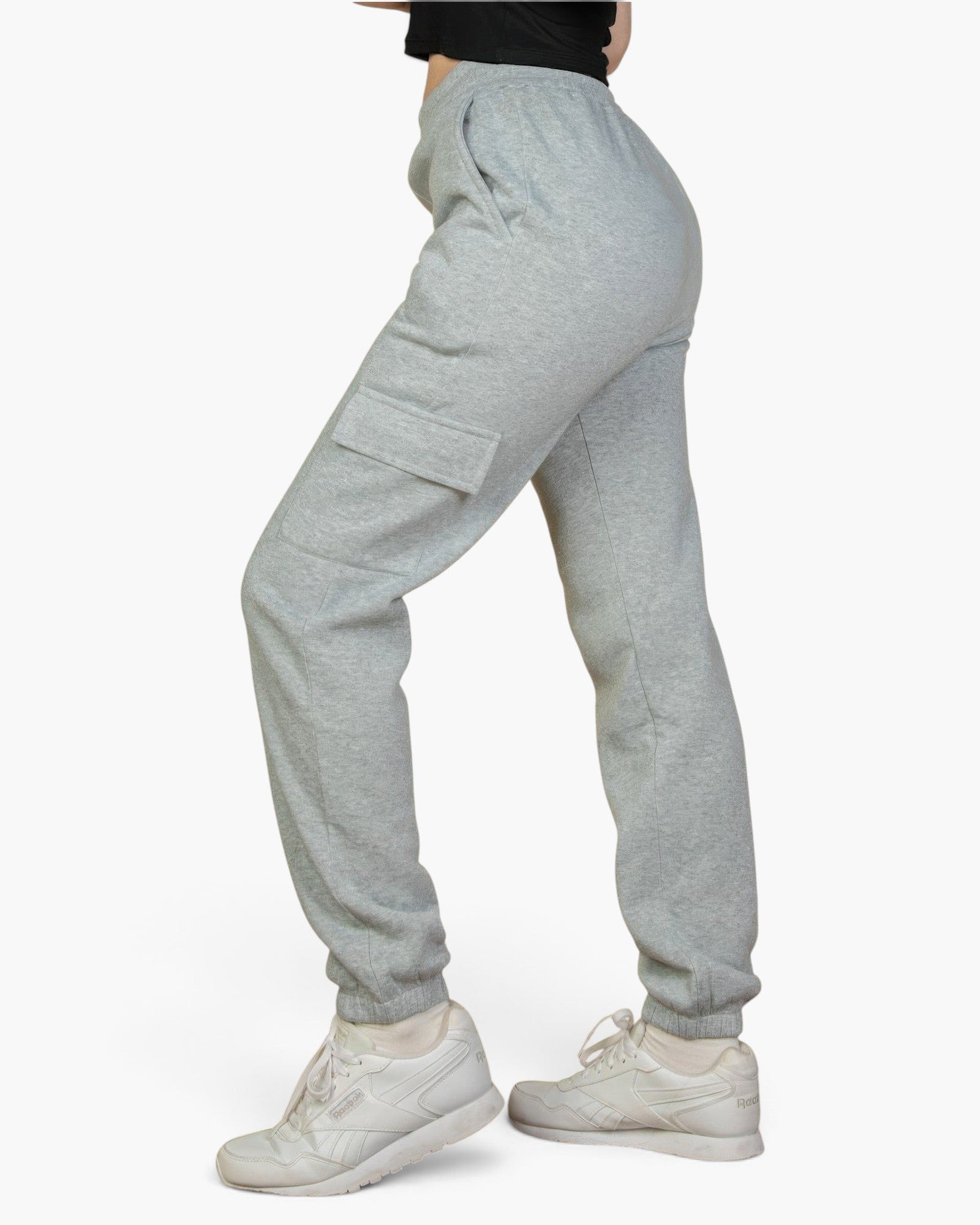 Beach Rose Co. heather gray sweatpants with side cargo pockets, drawstring waist, and cuffed ankles on a model