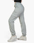 Beach Rose Co. heather gray sweatpants with side cargo pockets, drawstring waist, and cuffed ankles on a model