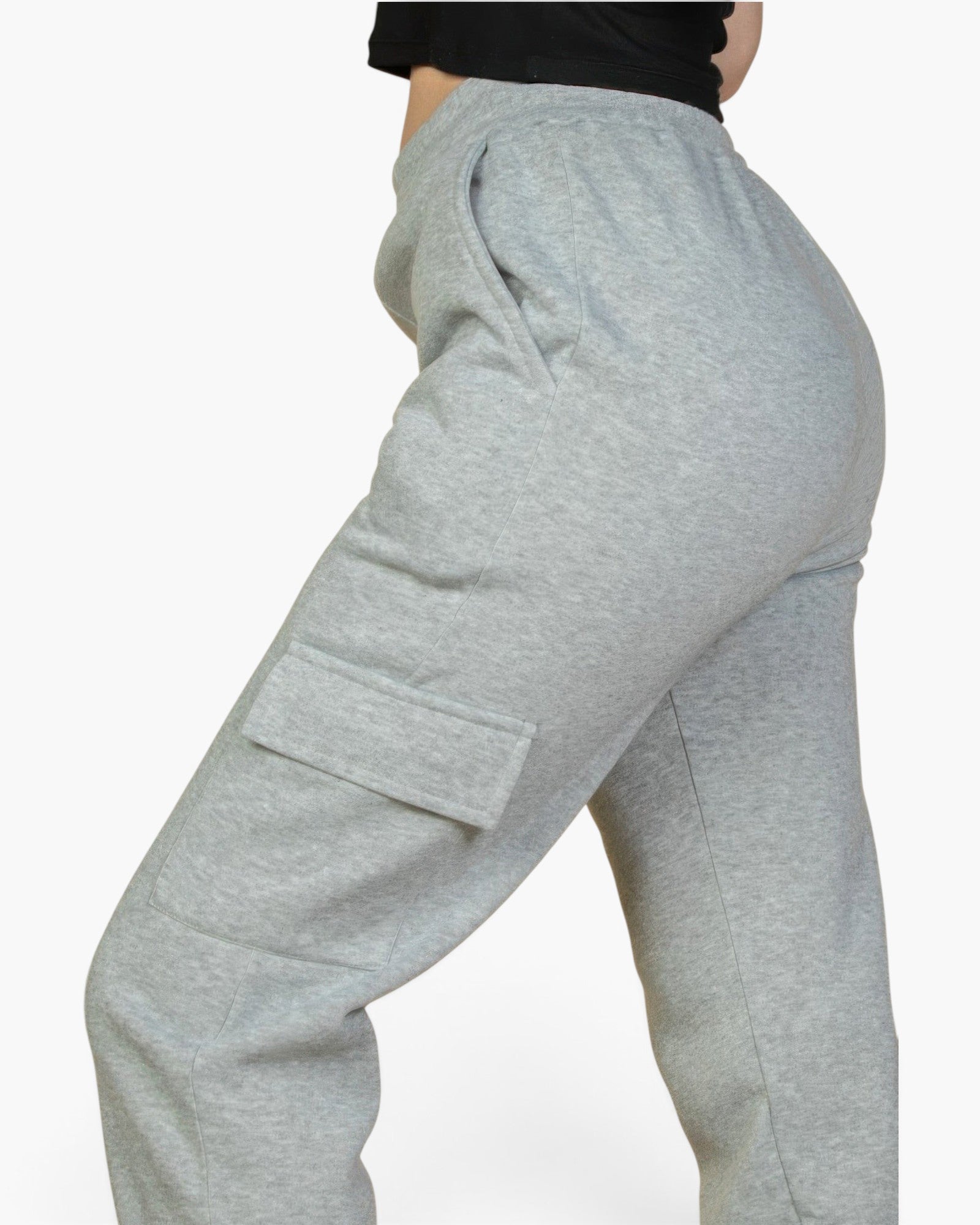 Beach Rose Co. heather gray sweatpants with side cargo pockets and a drawstring waist on a model