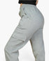Beach Rose Co. heather gray sweatpants with side cargo pockets and a drawstring waist on a model