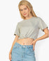 Beach Rose Co. heather grey French Terry crop top with an adjustable toggle drawstring hem worn by a blonde model.