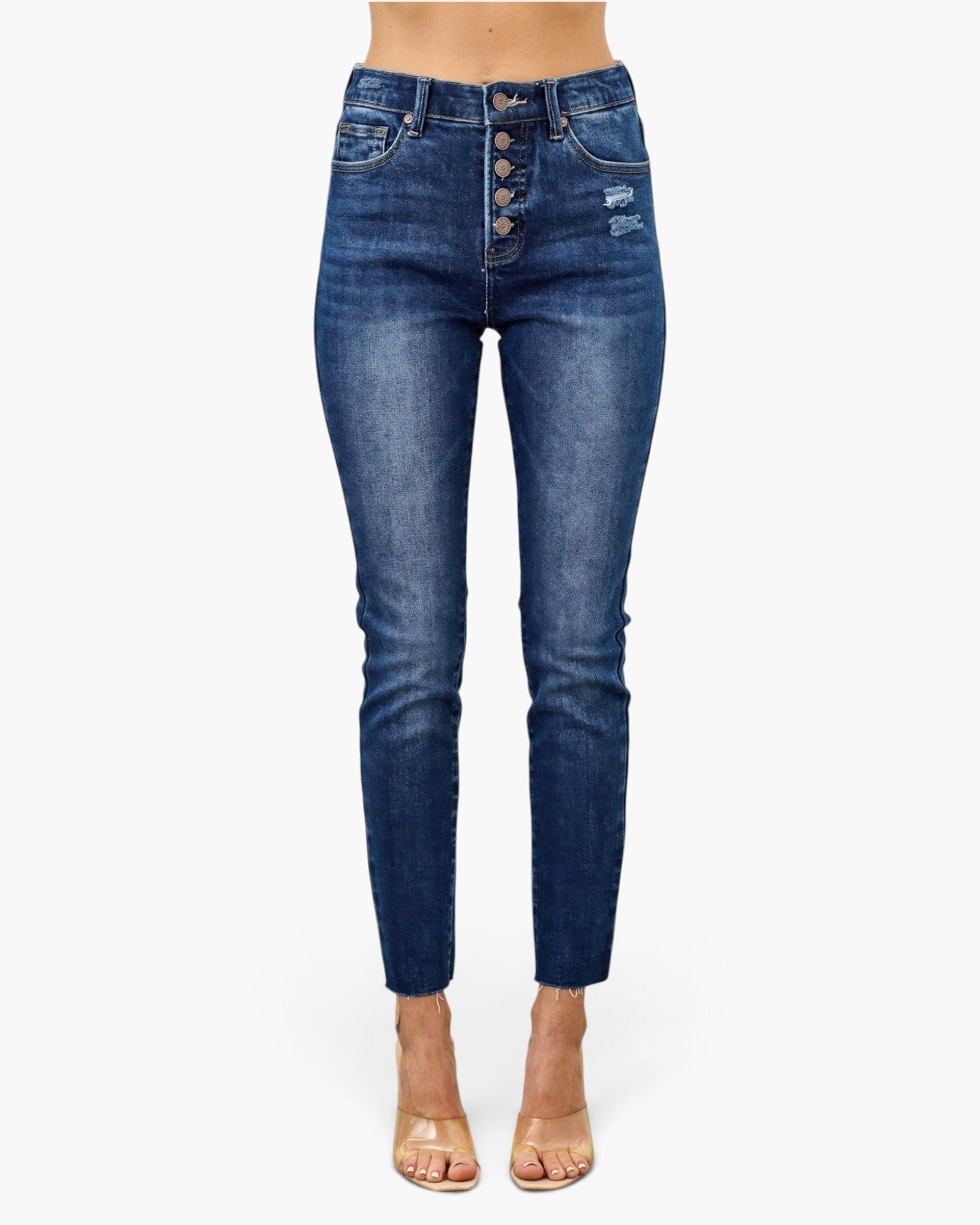 Beach Rose Co. high rise ankle skinny jeans in dark blue denim with an exposed button fly and distressed detail.