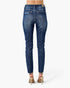Beach Rose Co. dark wash high rise skinny jeans with frayed ankle hems and back pockets, worn with nude heels.