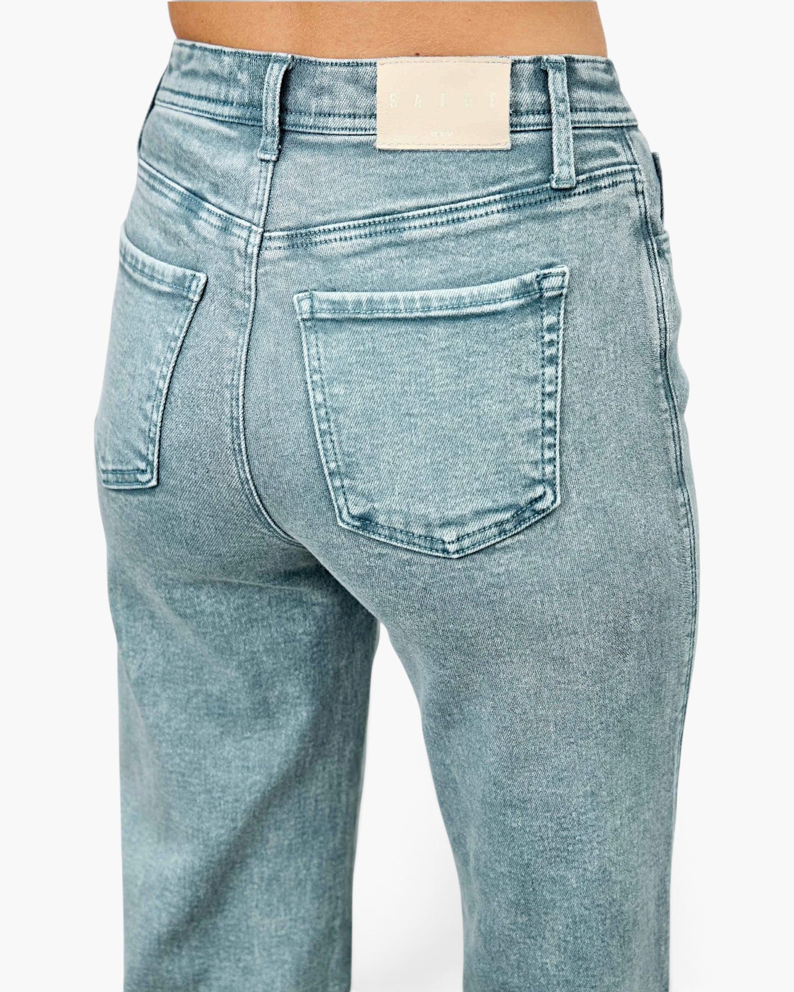 Beach Rose Co. high-rise slim wide straight jeans in light wash stretch denim with classic five-pocket back view